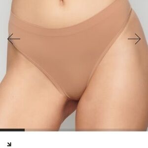NWT SKIMS Soft Smoothing Seamless Thong Sz Medium in color Ochre